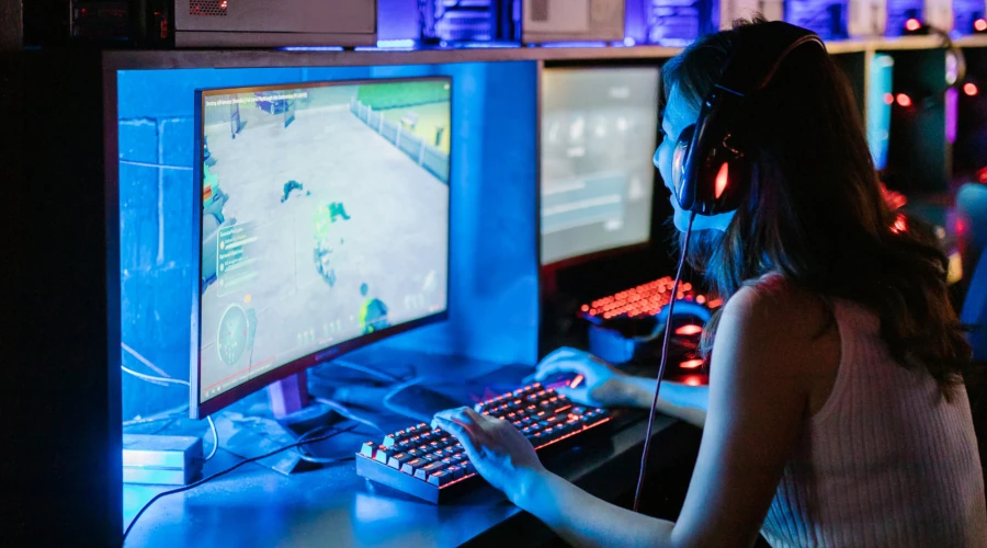 Girl Gamer Playing a PC Game